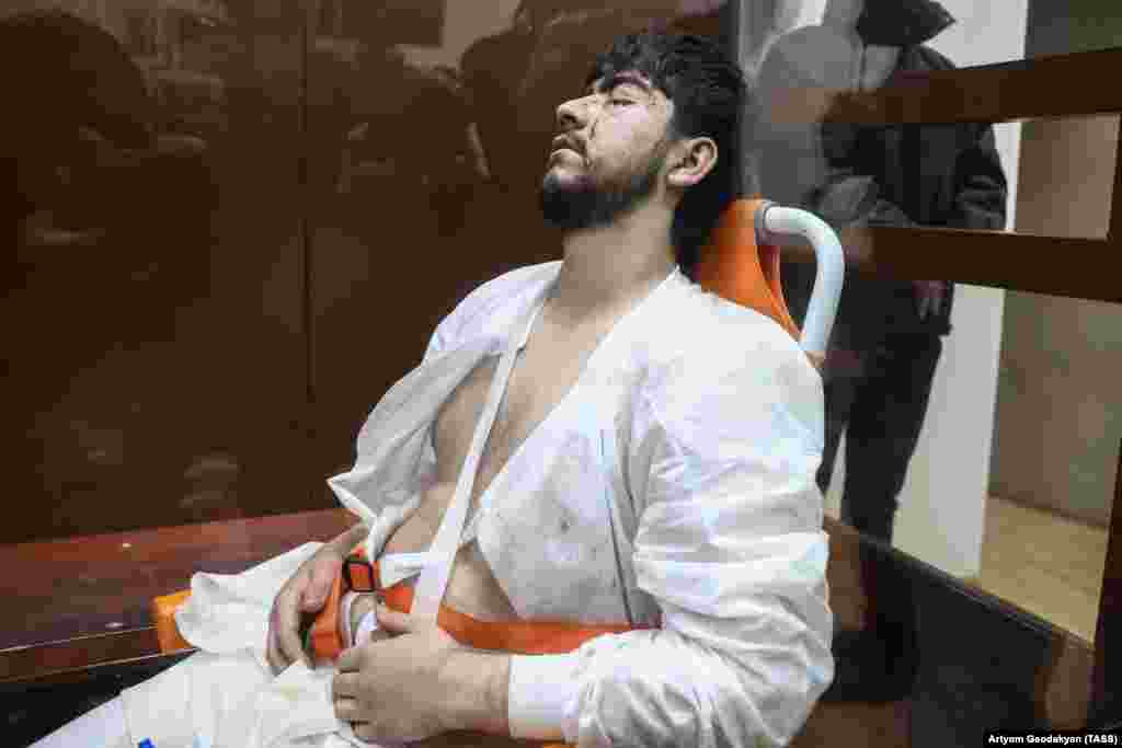 Faizov is seen here at a March 24 court hearing. The terror suspect was wheeled into the courtroom and appeared barely responsive during the appearance. 