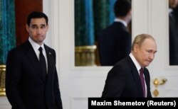 Russian President Vladimir Putin (right) meets with Serdar Berdymukhammedov in Moscow in June.