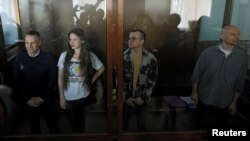 Подсудимые на заседании суда по делу об участии в ФБК