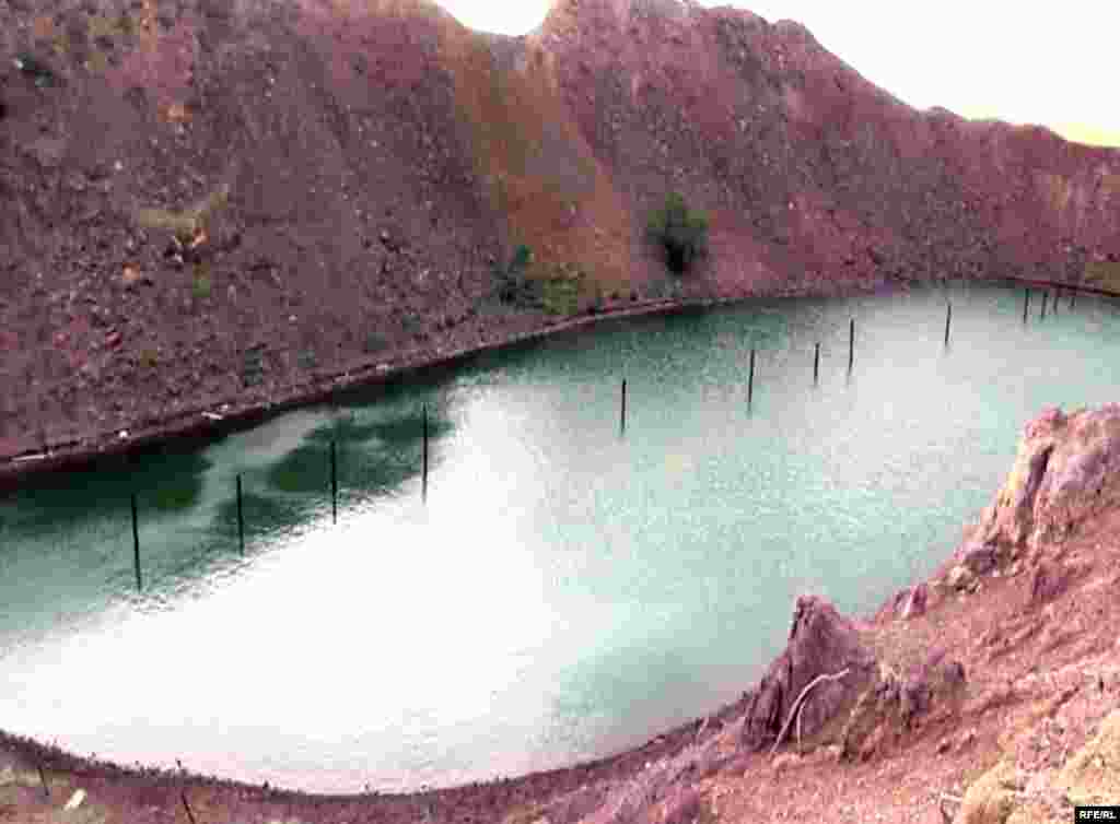 An "atomic" lake formed from a crater remaining after a series of nuclear explosions in the Semipalatinsk region.