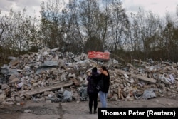 A pile of rubble left after a Russian strike in Ukraine's Kharkiv region in October 2023