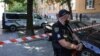 A police officer guards the murder site of former Ukrainian parliamentary speaker Andriy Parubiy in Lviv.