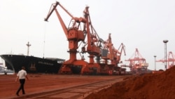 Soil containing various rare-earth elements waits to be loaded on to a ship at a port in Lianyungang, China. (File photo)