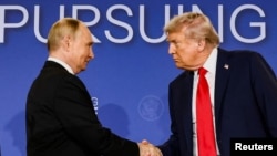 US President Donald Trump (right) meets with Russian President Vladimir Putin in Alaska in August.