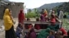 Injured Afghan women and girls sit as they receive medical treatment following an earthquake in the Mazar Dara village in Kunar province, Afghanistan.