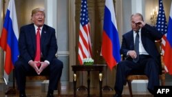 Фото от 16 июля 2018 года. Президент США Дональд Трамп и глава России Владимир Путин на встрече в Хельсинки, Финляндия